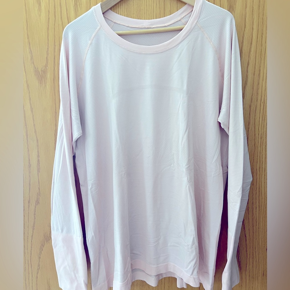 Swiftly Tech Long-Sleeve Shirt 2.0
Hip Length - Size 20